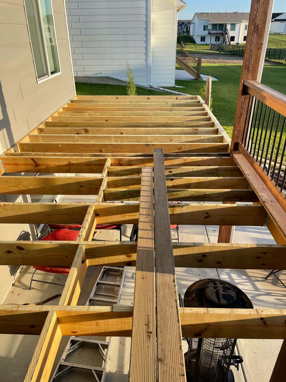Adding beams to an upper deck