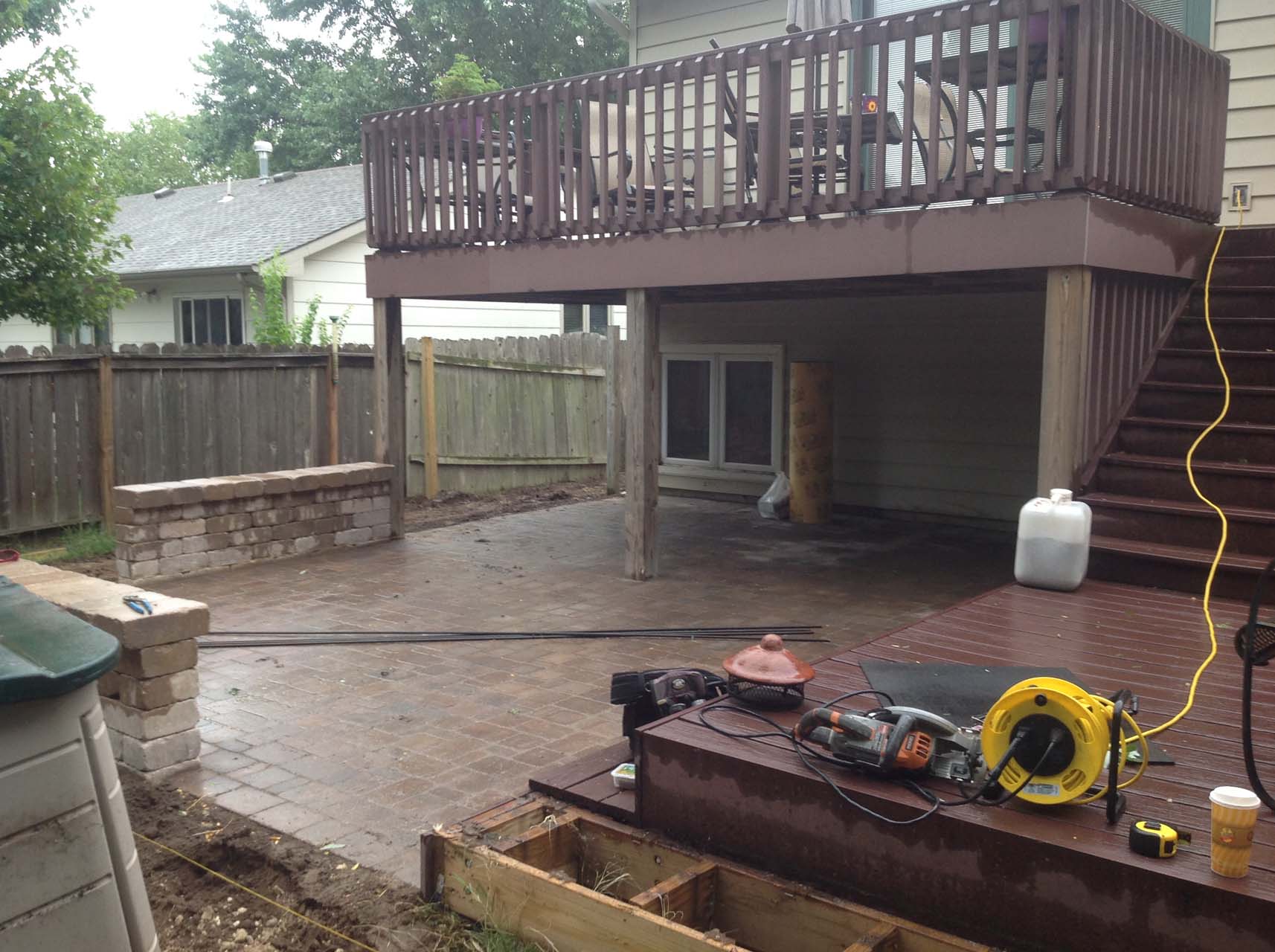 A brick patio starts to come together