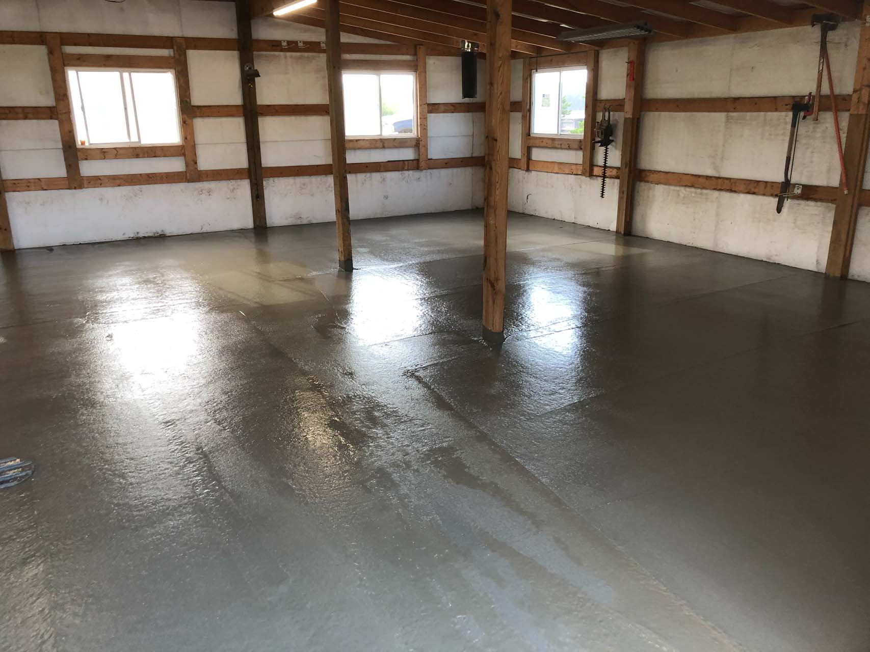 Freshly poured, and wet concrete floor