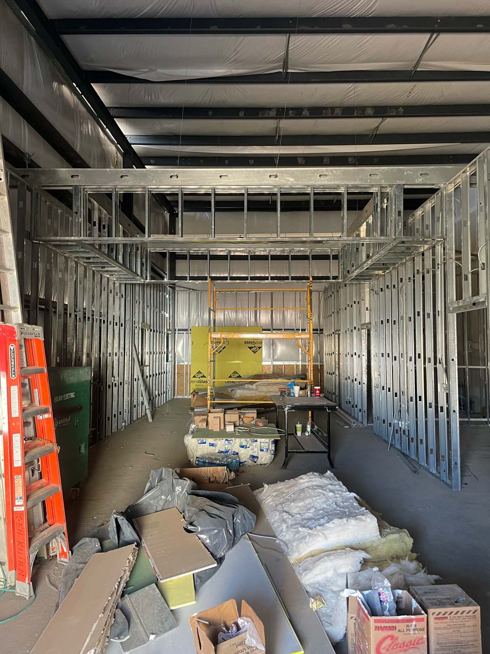 Inside the metal building as construction winds down