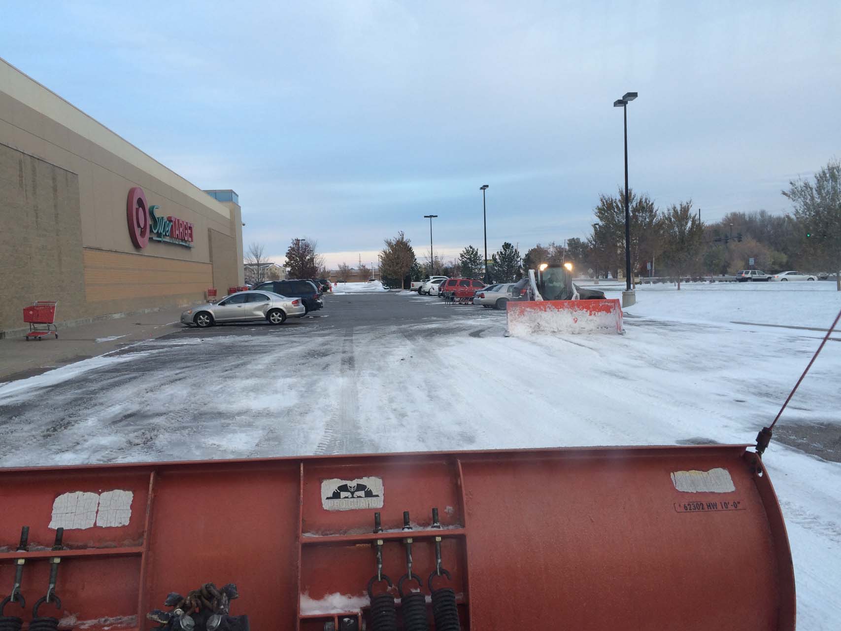 Removing snow in the Target parking lot